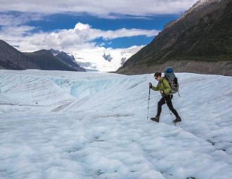 Person walking on glacier